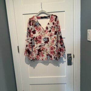 WHBM top, size 6, pinks, blues and burgundy on white background.